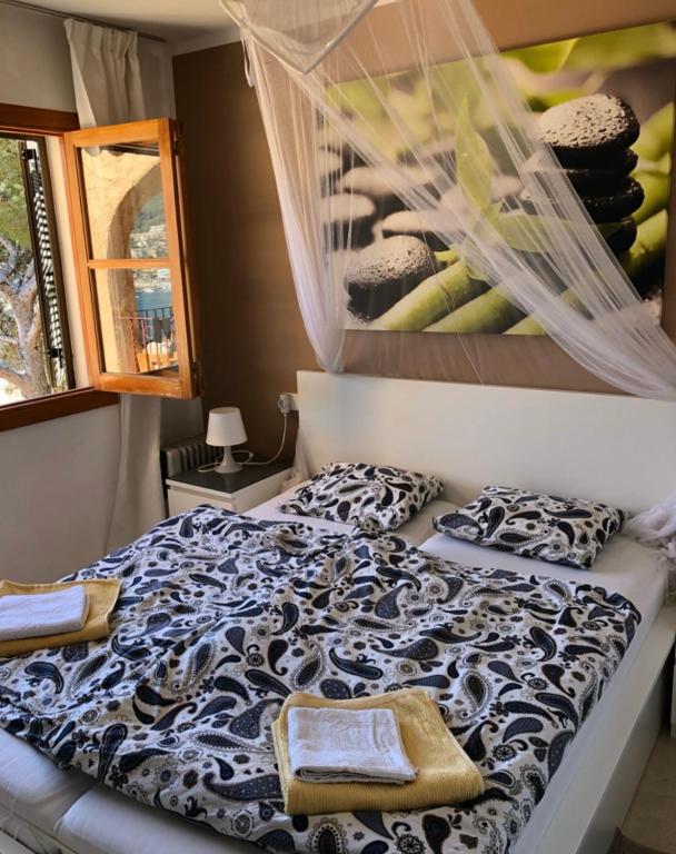 Postel nebo postele na pokoji v ubytování Hartmut Friedrich Apartment Port de Soller