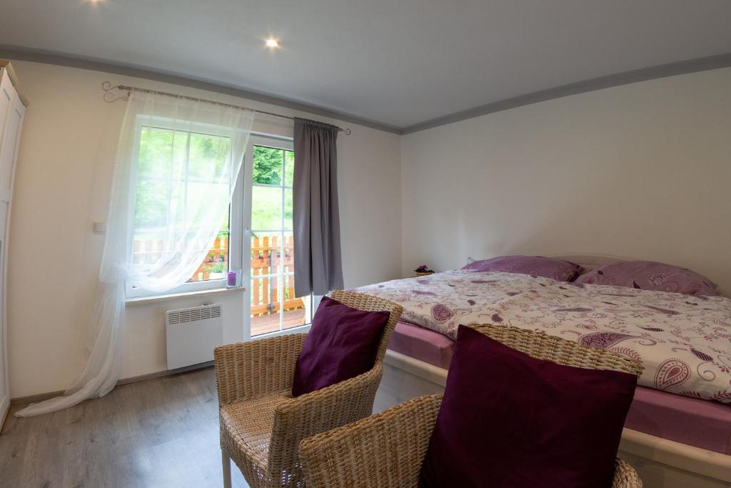 Postel nebo postele na pokoji v ubytování Villa Jana