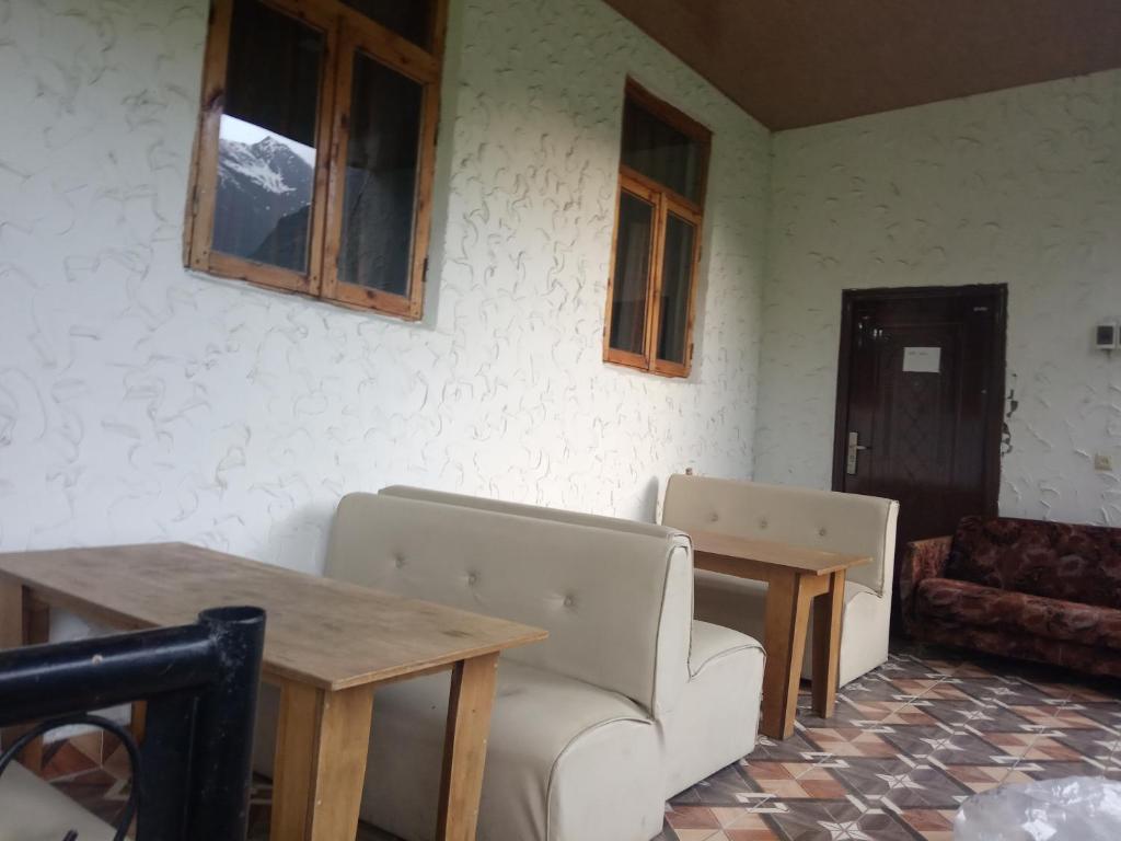 Posezení v ubytování Guest House Tavaduri