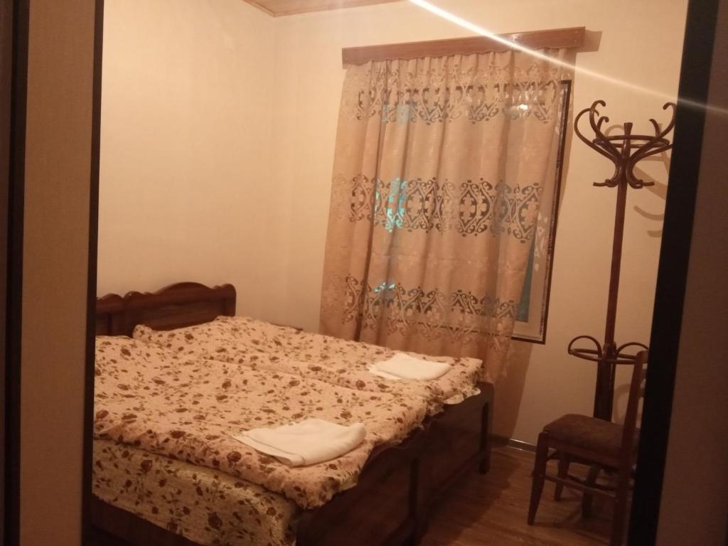 Postel nebo postele na pokoji v ubytování Guest House Tavaduri