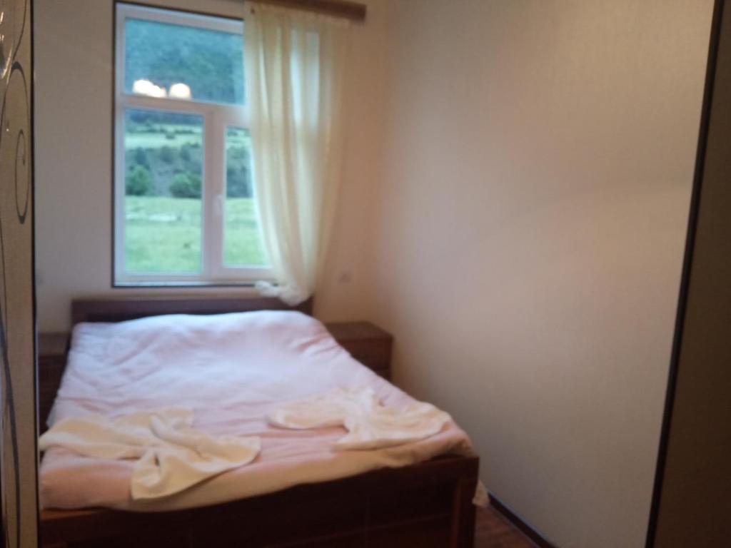 Postel nebo postele na pokoji v ubytování Guest House Tavaduri