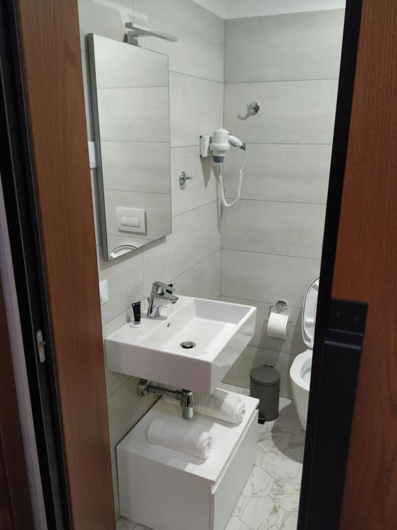Koupelna v ubytování Hotel Pelikan