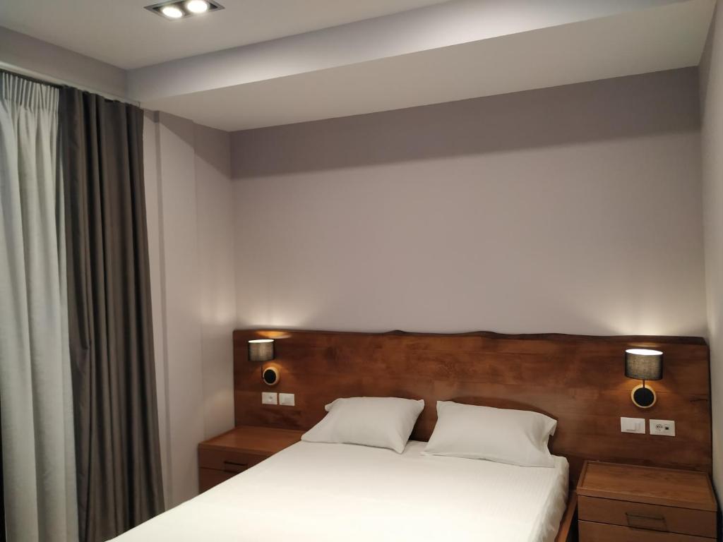 Postel nebo postele na pokoji v ubytování Hotel Pelikan