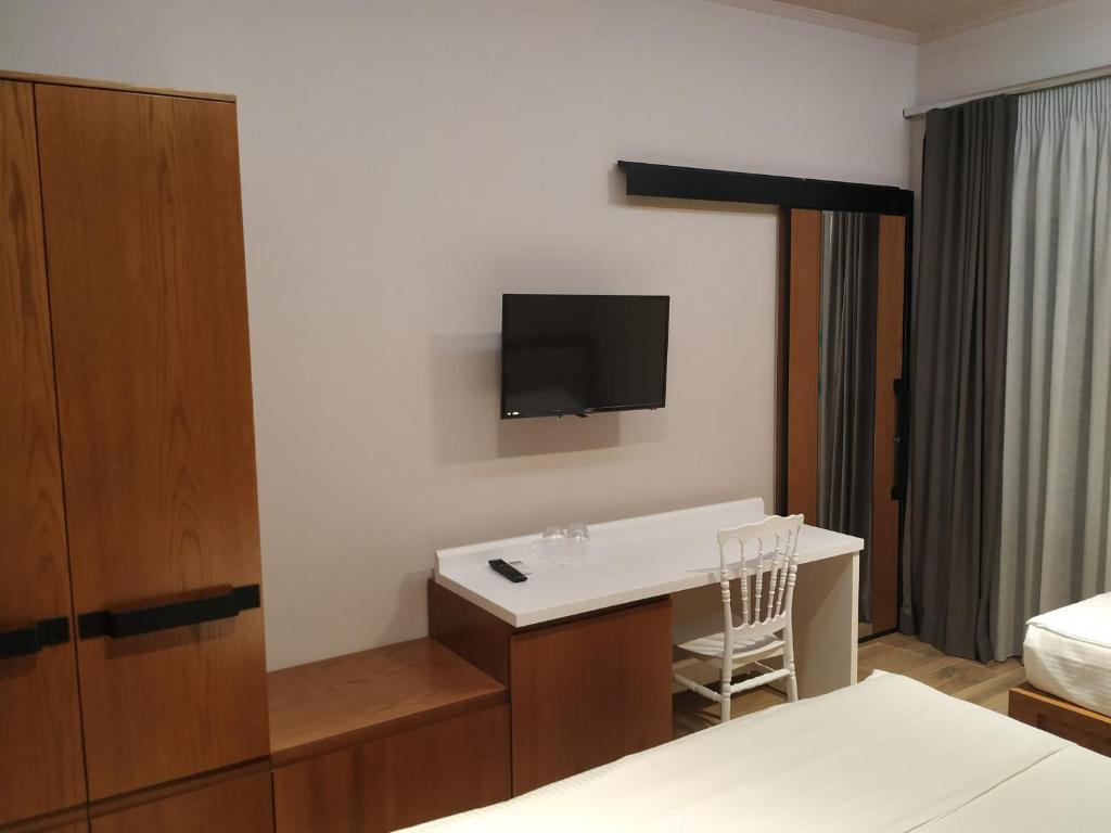 TV a/nebo společenská místnost v ubytování Hotel Pelikan