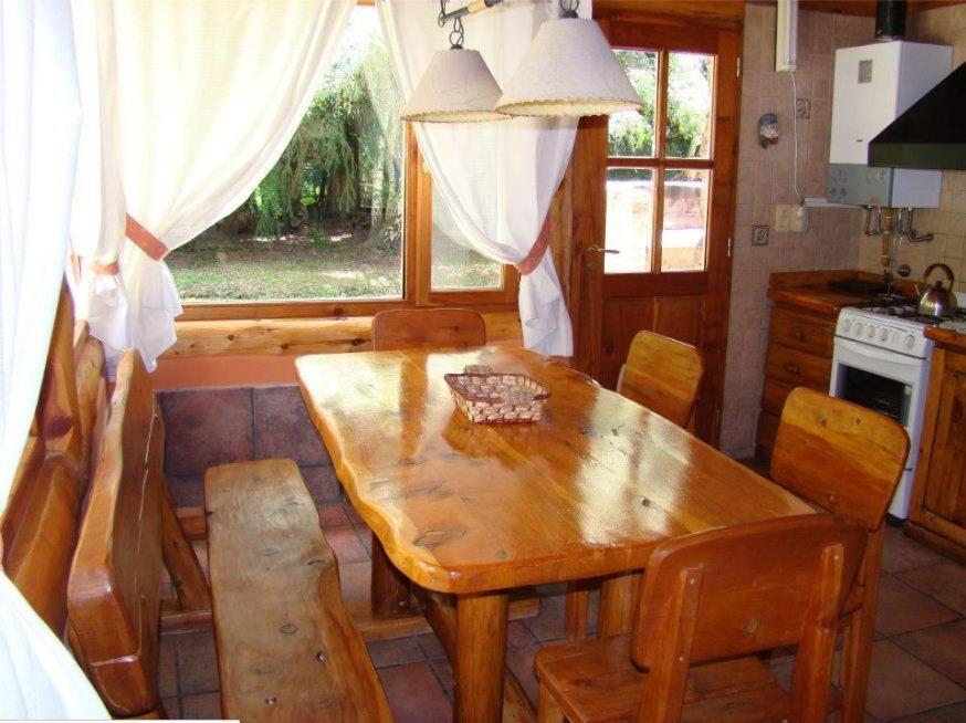 Kuchyň nebo kuchyňský kout v ubytování Cabañas En el Corazón del Bosque