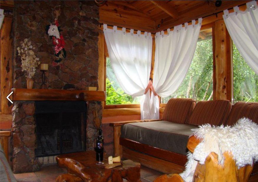 Posezení v ubytování Cabañas En el Corazón del Bosque