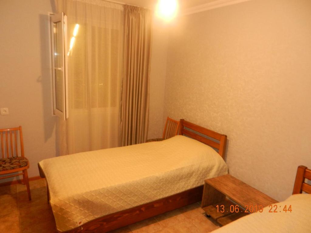 Postel nebo postele na pokoji v ubytování guest house katia tbilisi