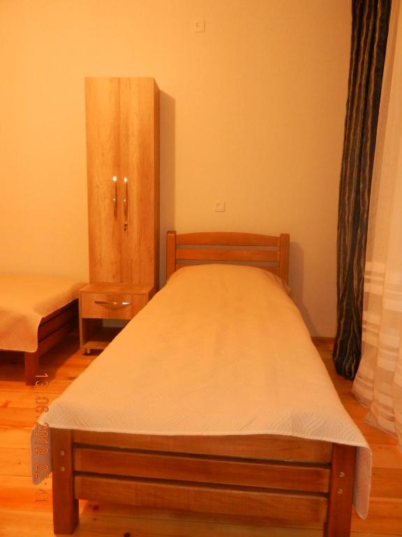 Postel nebo postele na pokoji v ubytování guest house katia tbilisi