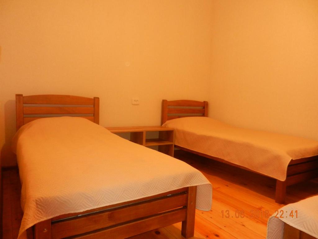 Postel nebo postele na pokoji v ubytování guest house katia tbilisi