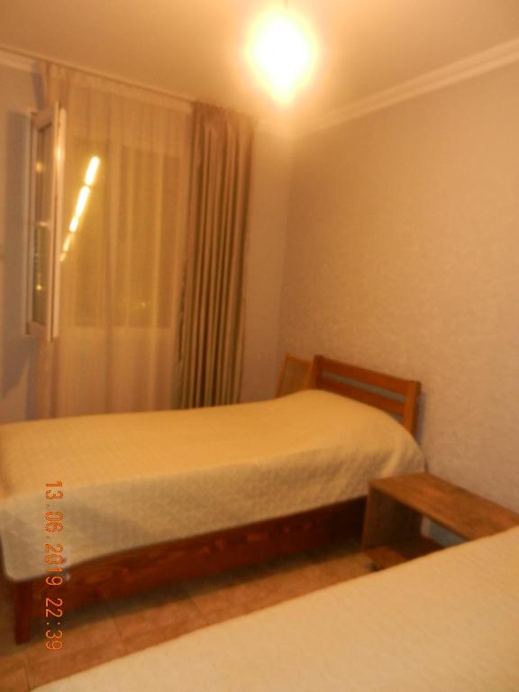 Postel nebo postele na pokoji v ubytování guest house katia tbilisi