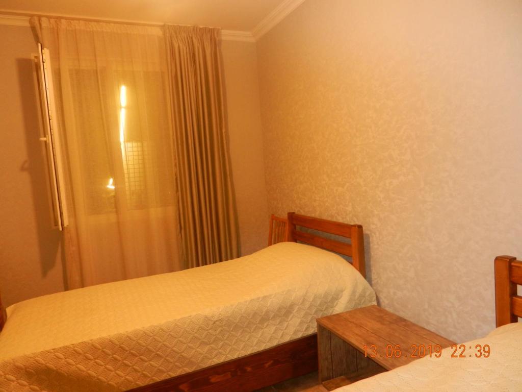 Postel nebo postele na pokoji v ubytování guest house katia tbilisi