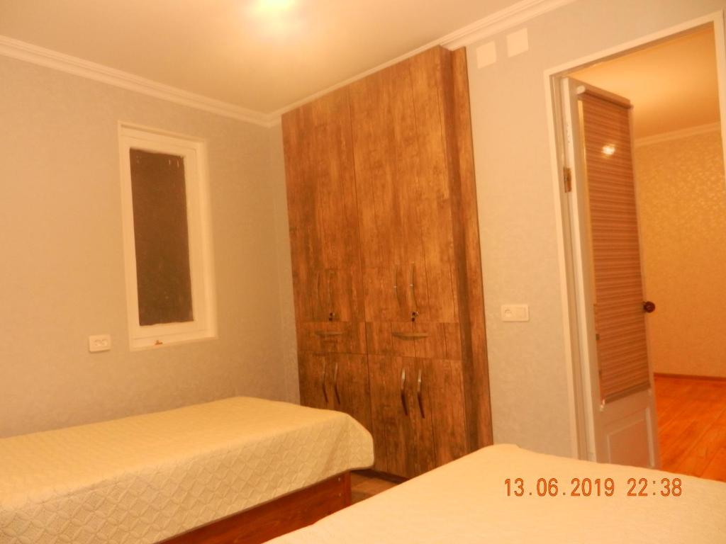 Postel nebo postele na pokoji v ubytování guest house katia tbilisi