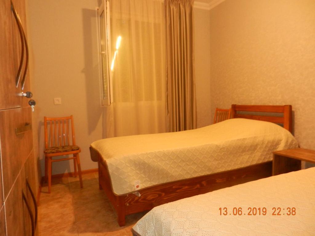 Postel nebo postele na pokoji v ubytování guest house katia tbilisi