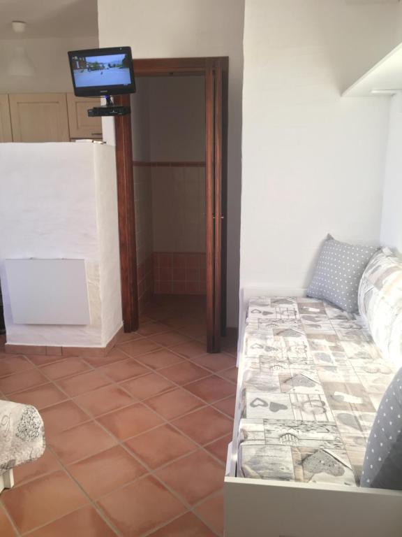 Postel nebo postele na pokoji v ubytování TERRAZZA SUL MARE wifi e piscina