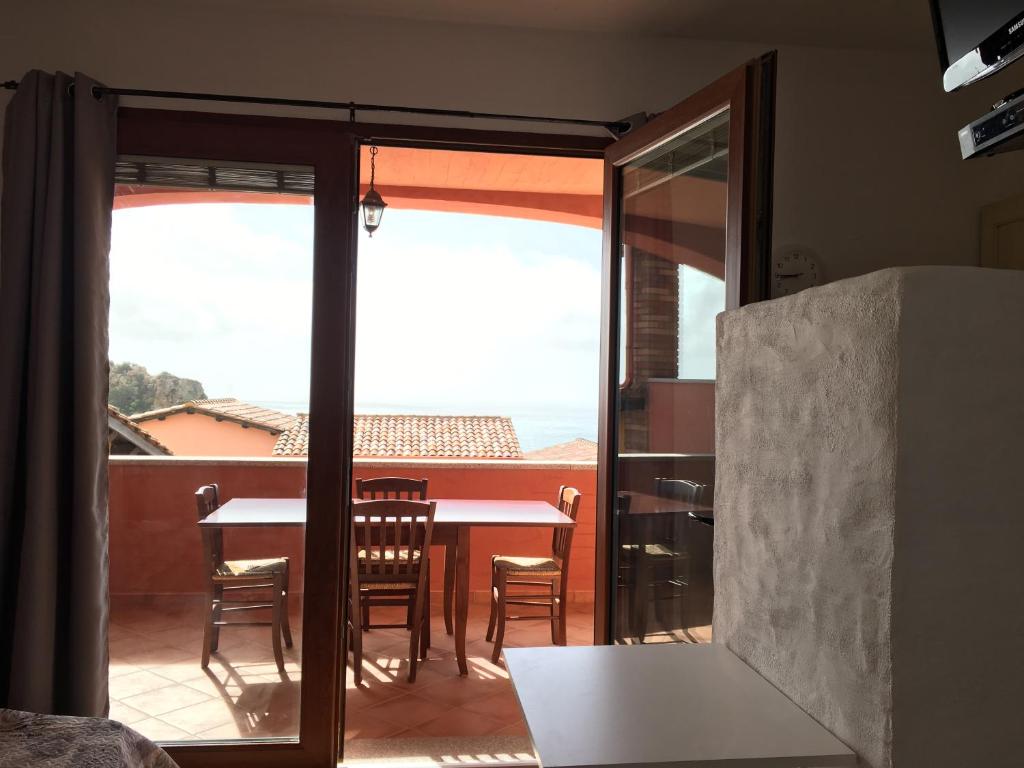Balkón nebo terasa v ubytování TERRAZZA SUL MARE wifi e piscina