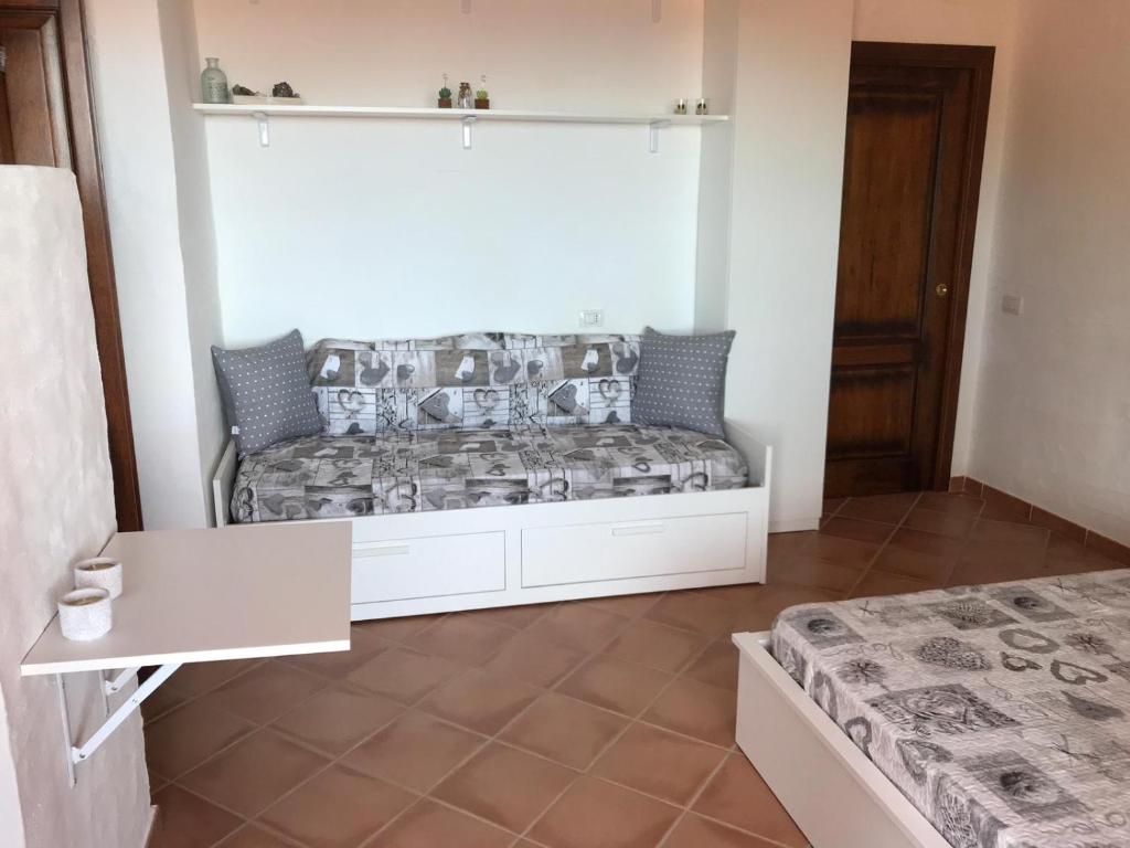 Postel nebo postele na pokoji v ubytování TERRAZZA SUL MARE wifi e piscina