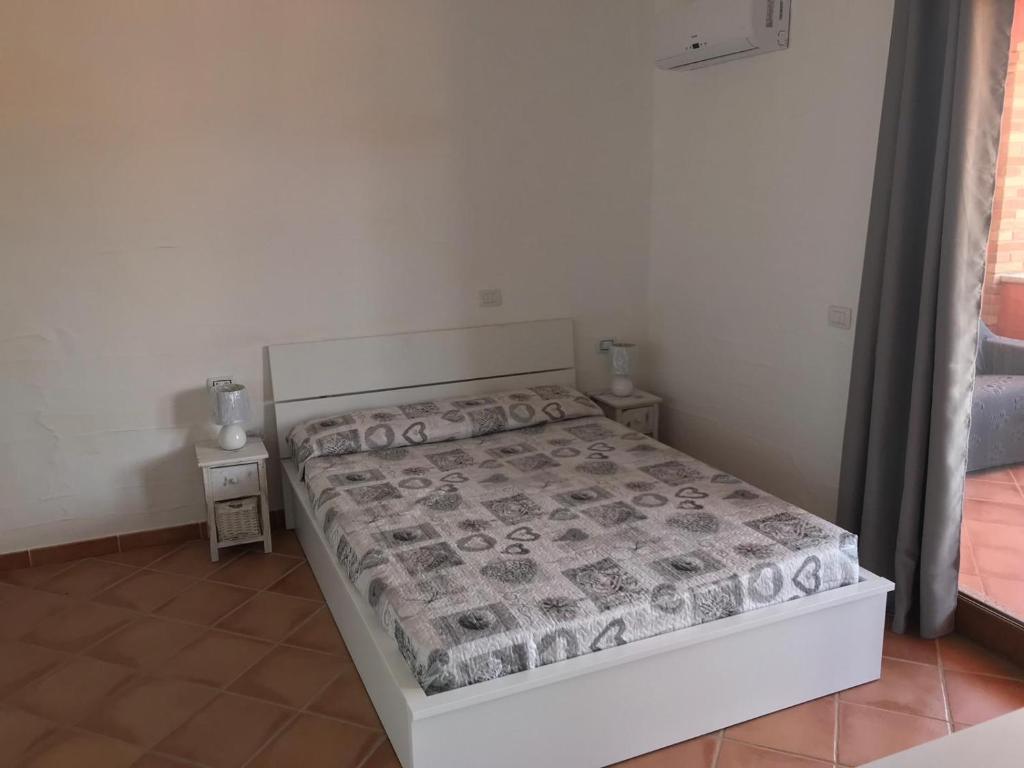 Postel nebo postele na pokoji v ubytování TERRAZZA SUL MARE wifi e piscina
