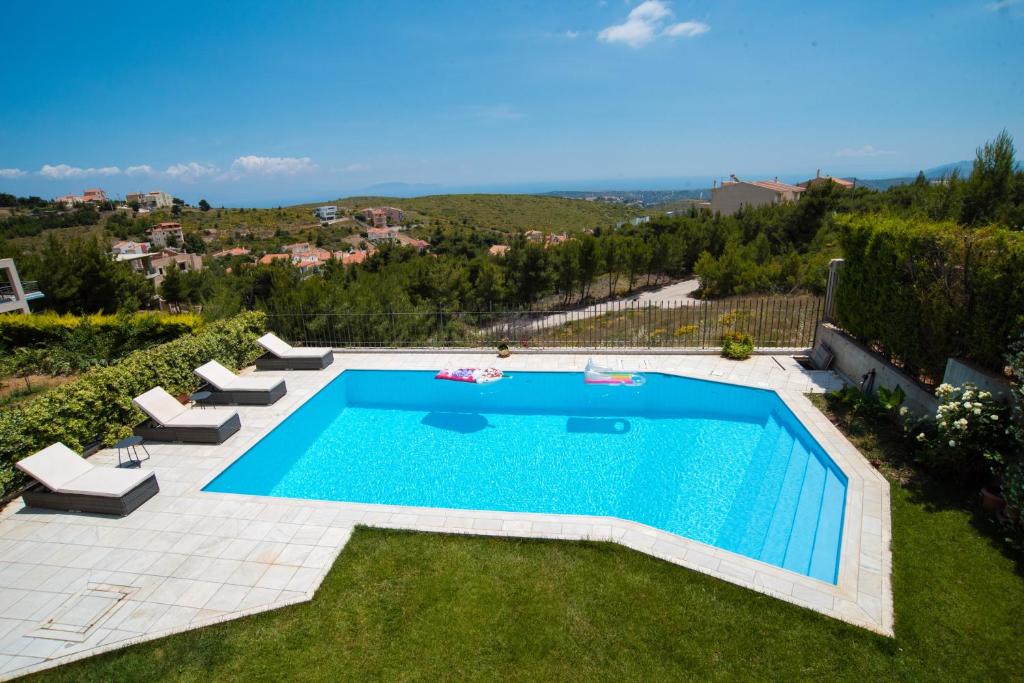 The swimming pool at or close to Villa Olympia VIP