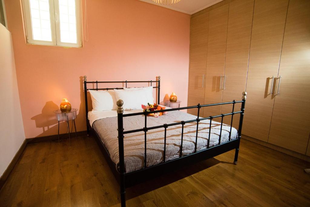 A bed or beds in a room at Villa Olympia VIP