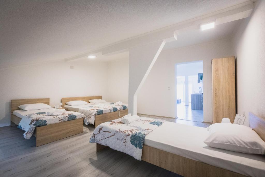 מיטה או מיטות בחדר ב-Eftimija Apartments