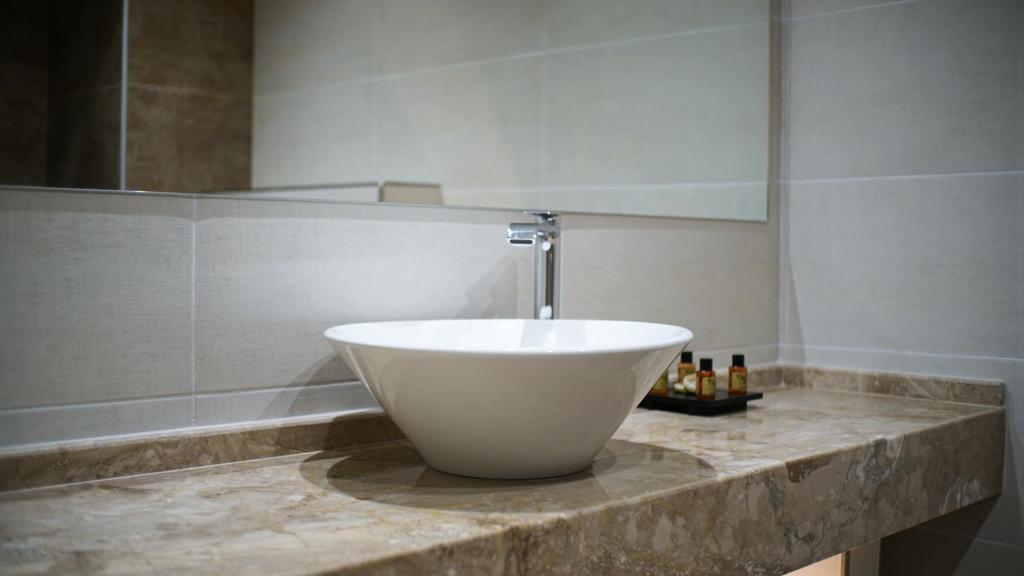 Koupelna v ubytování Agnes Deluxe Hotel