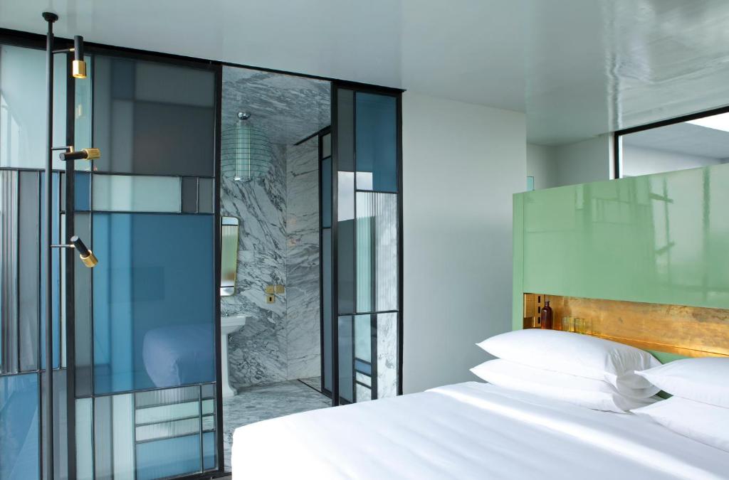 Postel nebo postele na pokoji v ubytování Casa Habita, a Member of Design Hotels