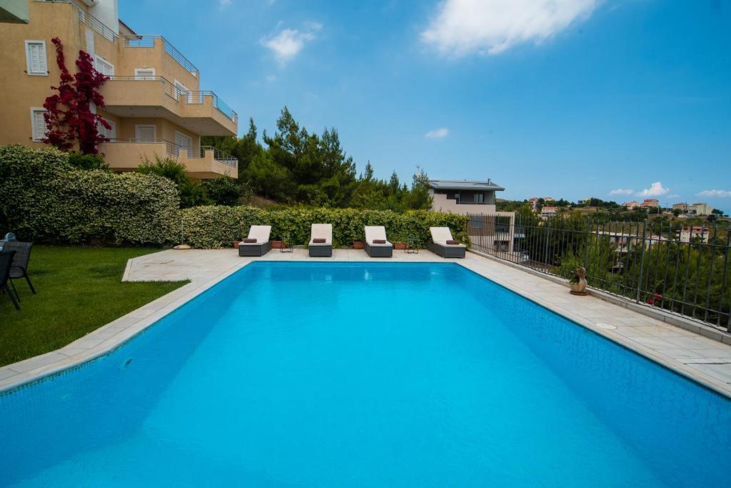 The swimming pool at or close to Villa Olympia VIP
