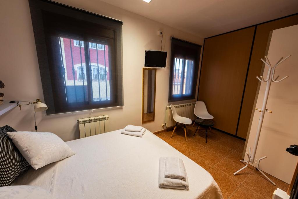 Posteľ alebo postele v izbe v ubytovaní Apartamento Turístico San Jorge