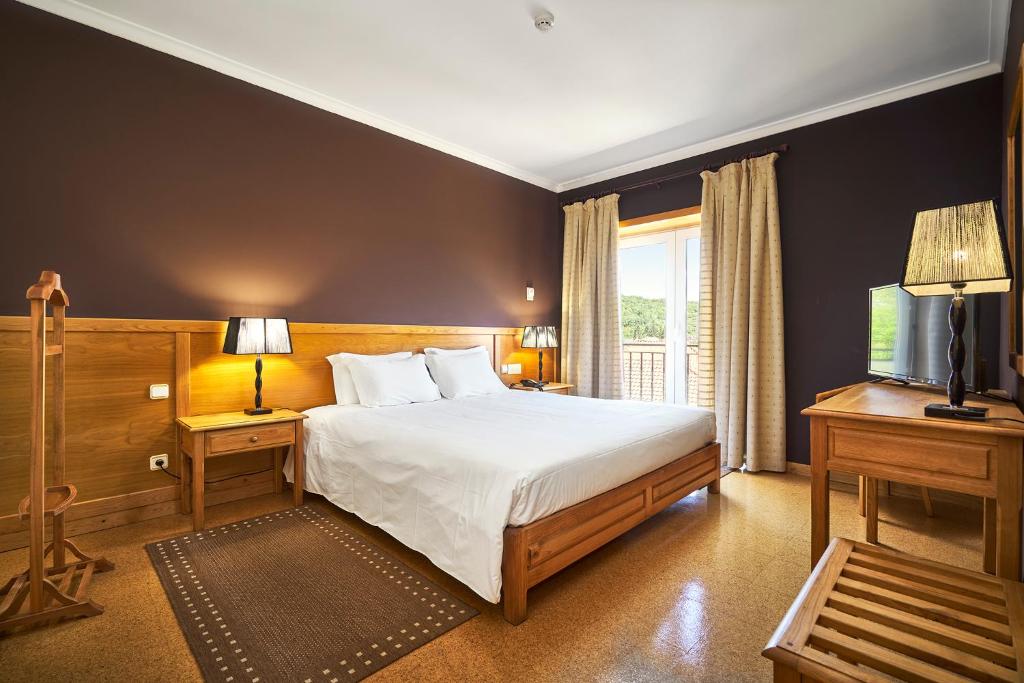 Postel nebo postele na pokoji v ubytování Hotel Castrum Villae by Walk Hotels