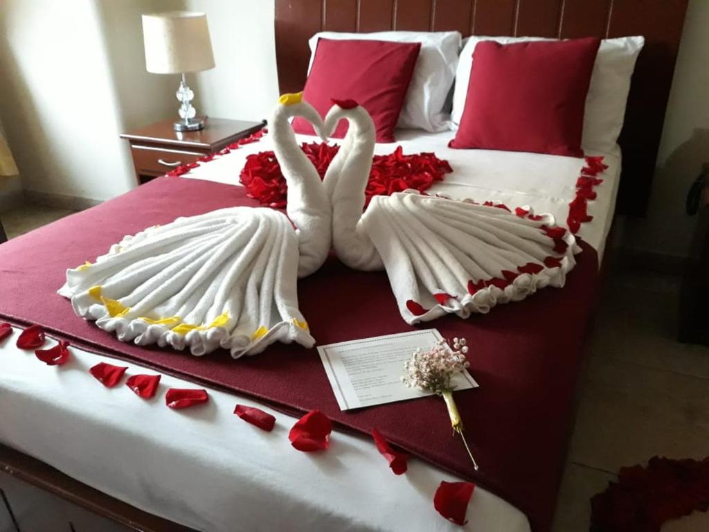 Letto o letti in una camera di Hotel Onix Gold