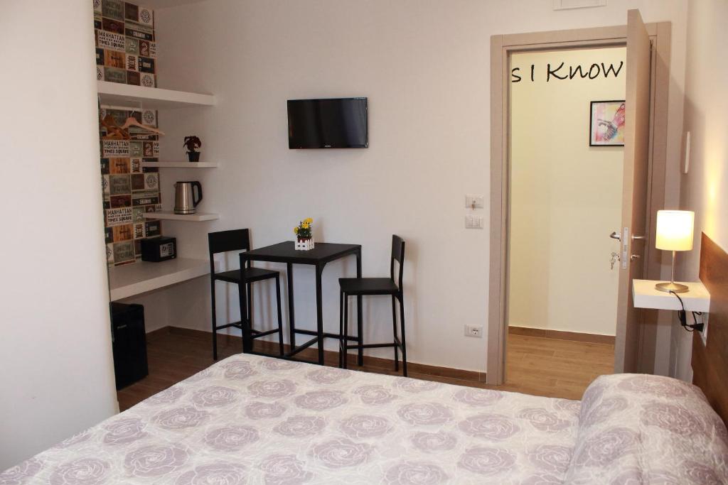 Posteľ alebo postele v izbe v ubytovaní B&B Allerìa Pozzuoli