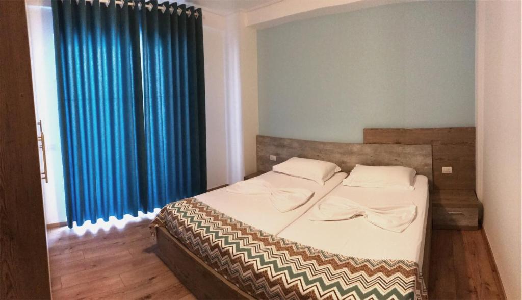 Postel nebo postele na pokoji v ubytování Aquamarine Apartments