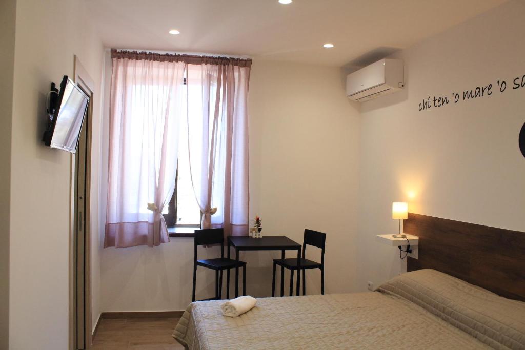 Posteľ alebo postele v izbe v ubytovaní B&B Allerìa Pozzuoli