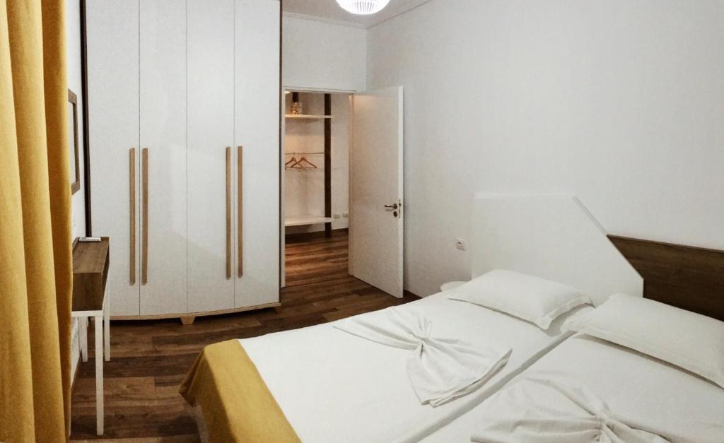 Postel nebo postele na pokoji v ubytování Aquamarine Apartments