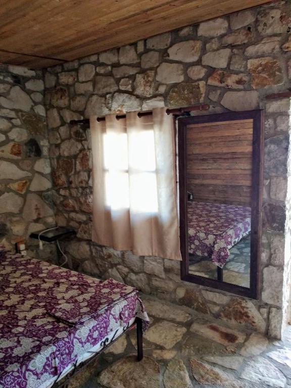 Letto o letti in una camera di Filoxenia - The Place of Experience