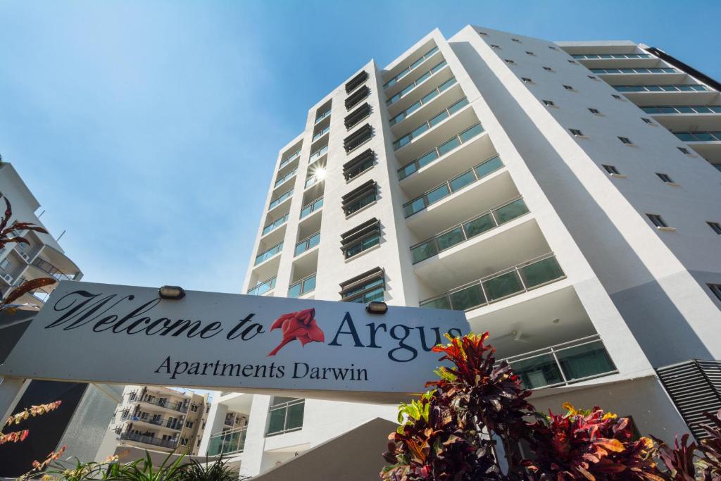 a building with a welcome to africa sign in front of it at Argus Apartments Darwin in Darwin