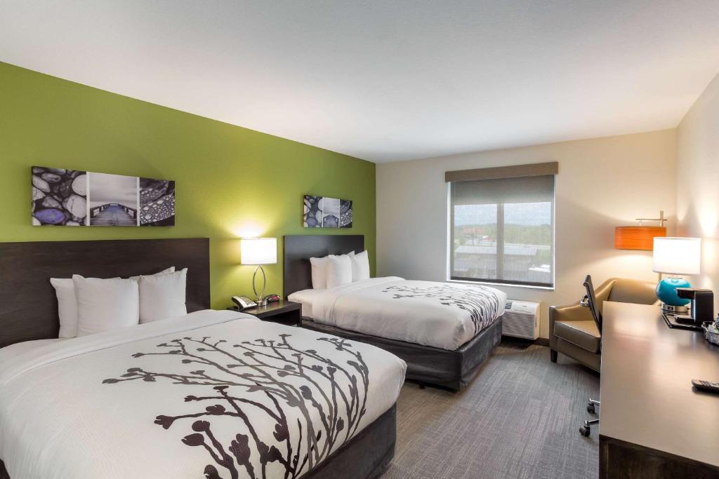 Ένα ή περισσότερα κρεβάτια σε δωμάτιο στο Sleep Inn Logan Ohio-Hocking Hills