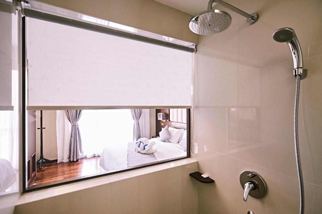 Koupelna v ubytování Meritin Hotel
