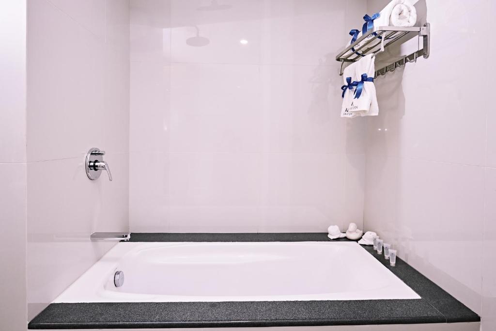 Koupelna v ubytování Meritin Hotel
