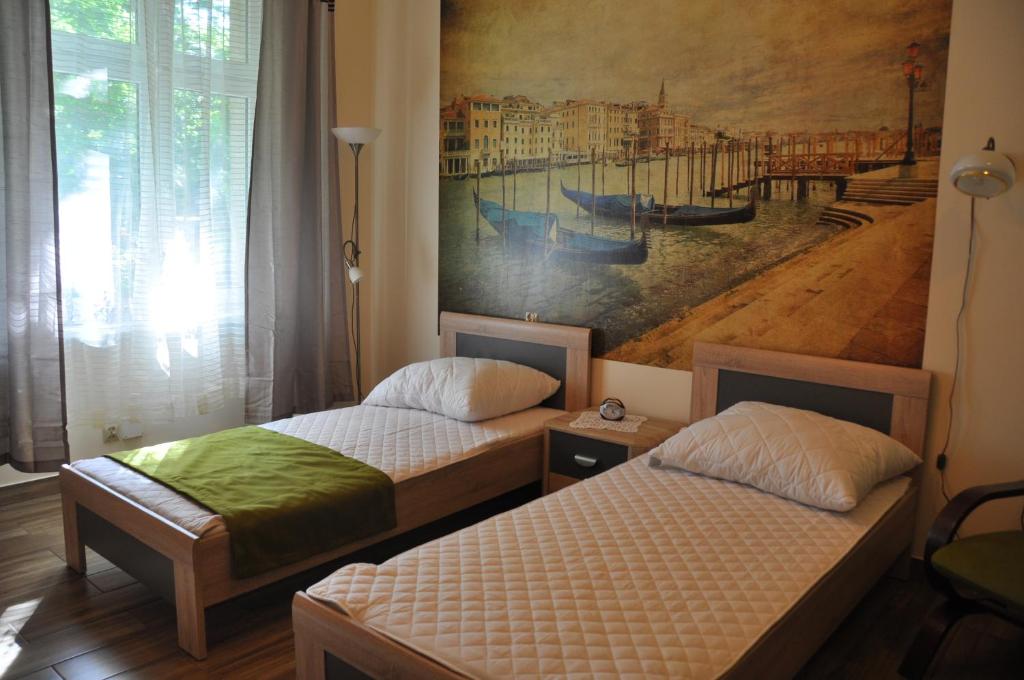 Posteľ alebo postele v izbe v ubytovaní Wenecja 4A by Homeprime