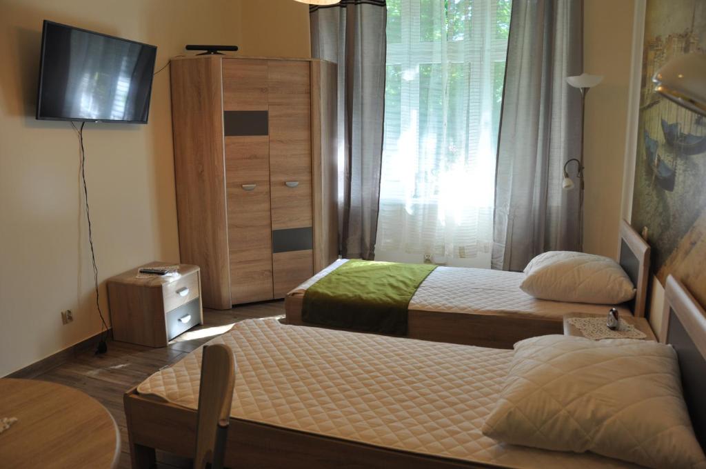 Posteľ alebo postele v izbe v ubytovaní Wenecja 4A by Homeprime