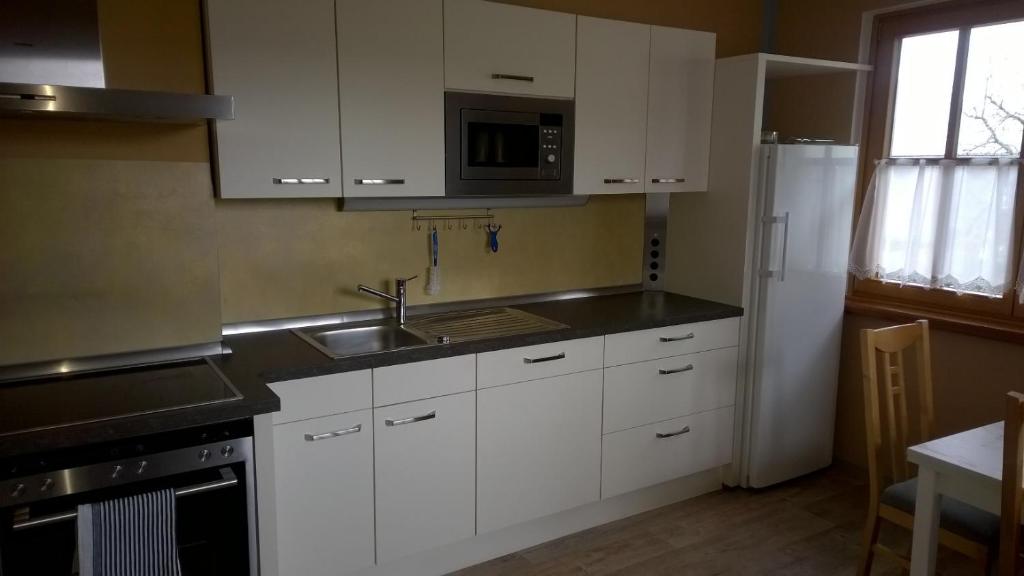 Kuchyň nebo kuchyňský kout v ubytování Holiday House Spanner