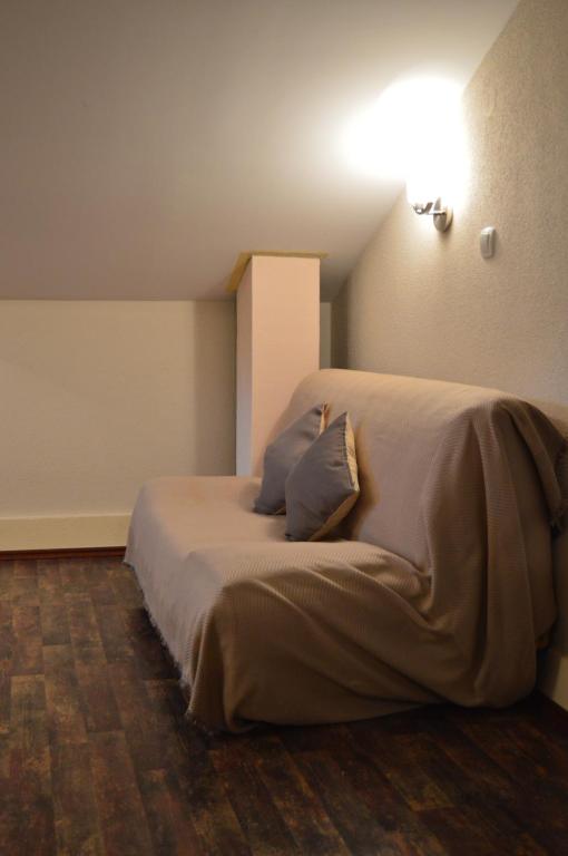 Una cama o camas en una habitación de Apartments Qualitas