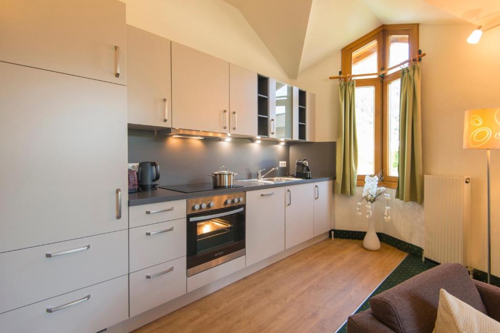 Kuchyň nebo kuchyňský kout v ubytování Hotel Das Gastein - ganzjährig inklusive Alpentherme Gastein & Sommersaison inklusive Gasteiner Bergbahnen