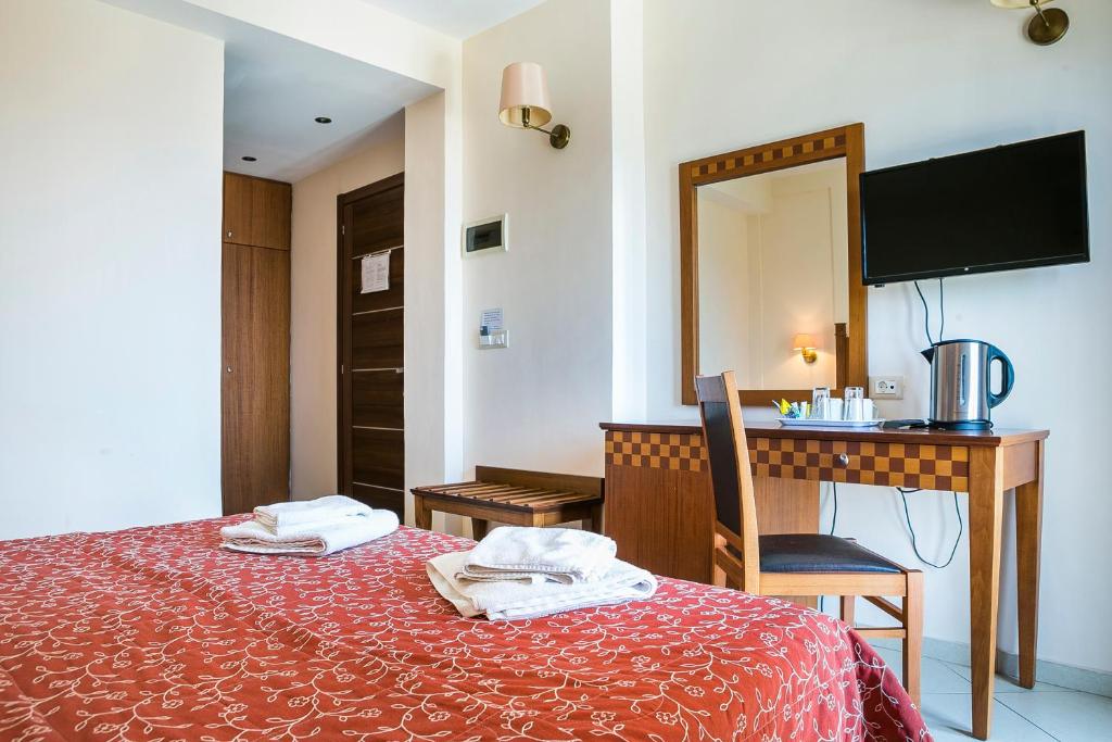 Postel nebo postele na pokoji v ubytování Lassi Hotel
