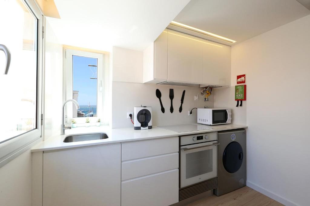 Kuchyň nebo kuchyňský kout v ubytování CAROL BEACH HOUSE