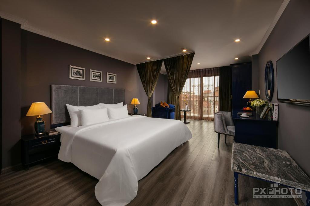 Postel nebo postele na pokoji v ubytování Matilda Boutique Hotel & Spa