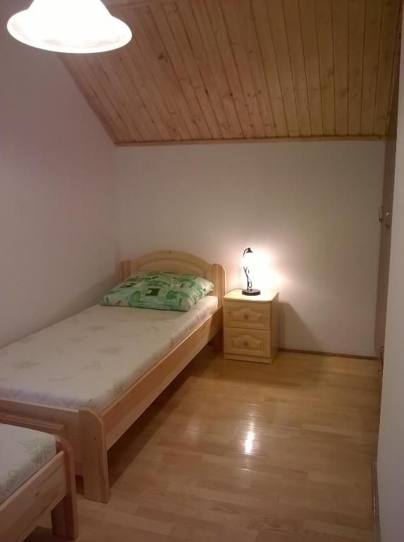 Postel nebo postele na pokoji v ubytování ZENITH APARTMAN