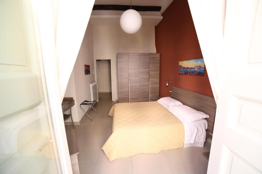 Łóżko lub łóżka w pokoju w obiekcie Casa Amato
