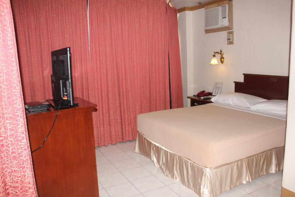 Postel nebo postele na pokoji v ubytování Elegant Circle Inn